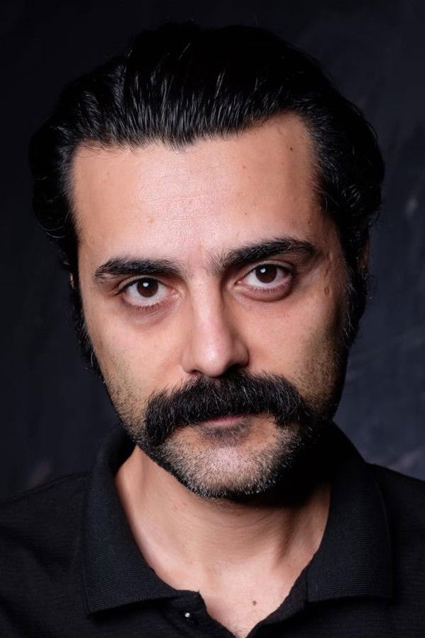 Ercan Özdal Biography