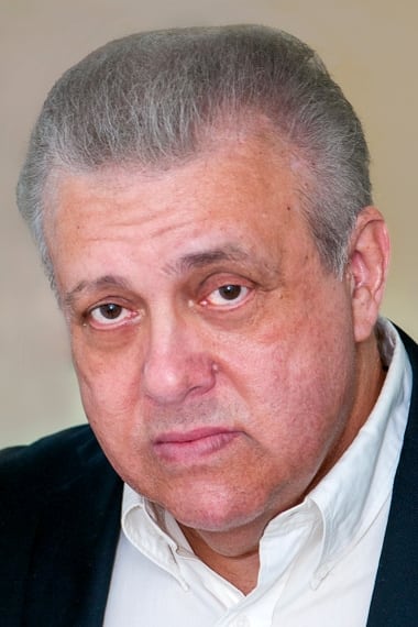 Vic Polizos Biography